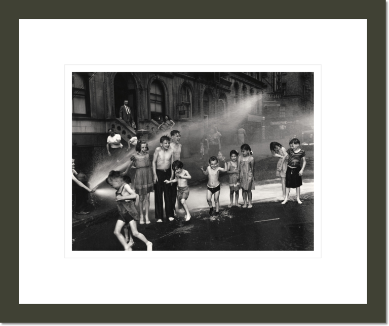 [Children playing in water sprayed from open fire hydrant, Upper West Side, New York]
