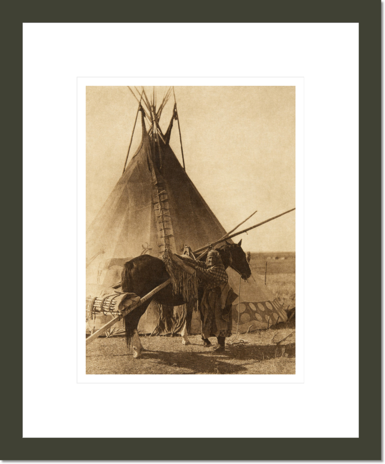 Transporting the ceremonial bag and tipi-cover of a Blackfoot society (The North American Indian, v. XVIII. Norwood, MA, The Plimpton Press)