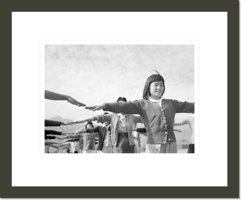 Calesthenics [sic] Female interns practicing calisthenics at Manzanar internment camp