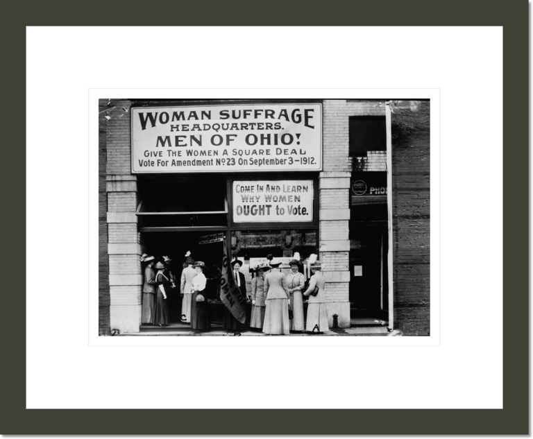 Woman suffrage headquarters in Upper Euclid Avenue, Cleveland--A. (at extreme right) is Miss Belle Sherwin, President, National League of Women Voters; B. is Judge Florence E. Allen (holding the flag); C. is Mrs. Malcolm McBride